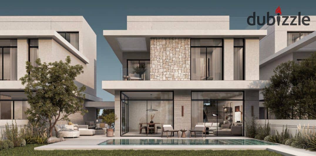 Live in a villa with a landscape view, in installments over 9 years, in a prime location in Sheikh Zayed, next to SODIC 0