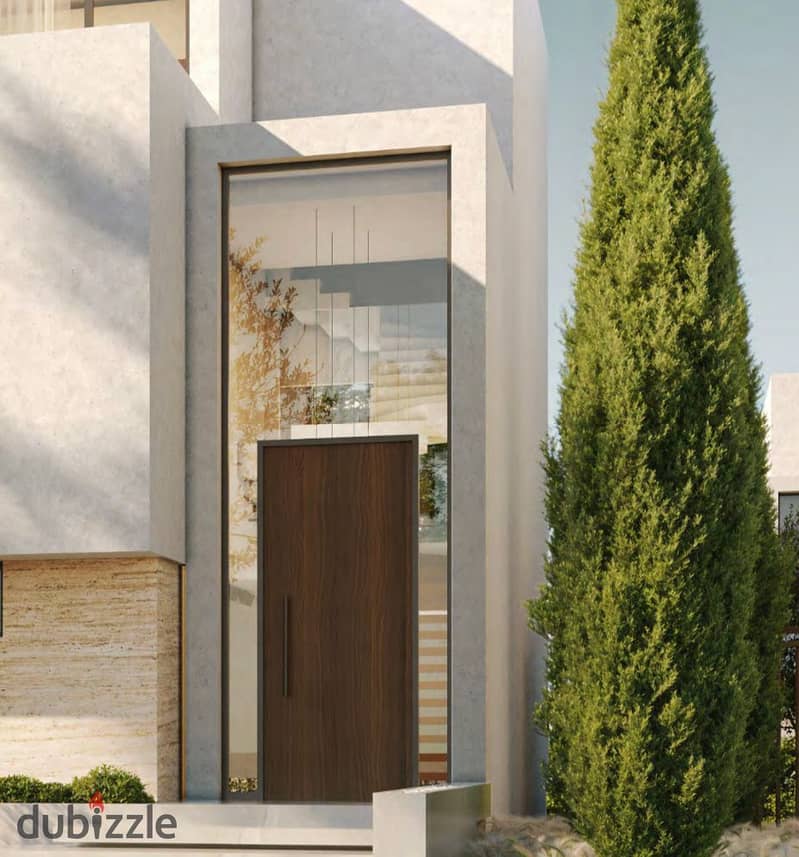 Live in a villa with a landscape view, in installments over 9 years, in a prime location in Sheikh Zayed, next to SODIC 7