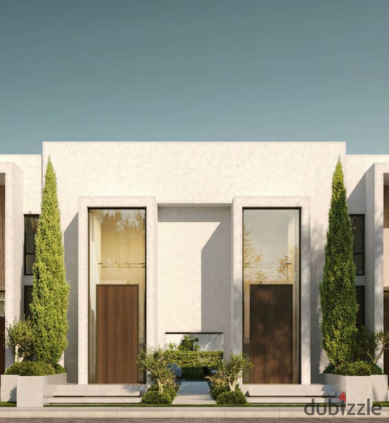 Live in a villa with a landscape view, in installments over 9 years, in a prime location in Sheikh Zayed, next to SODIC 8