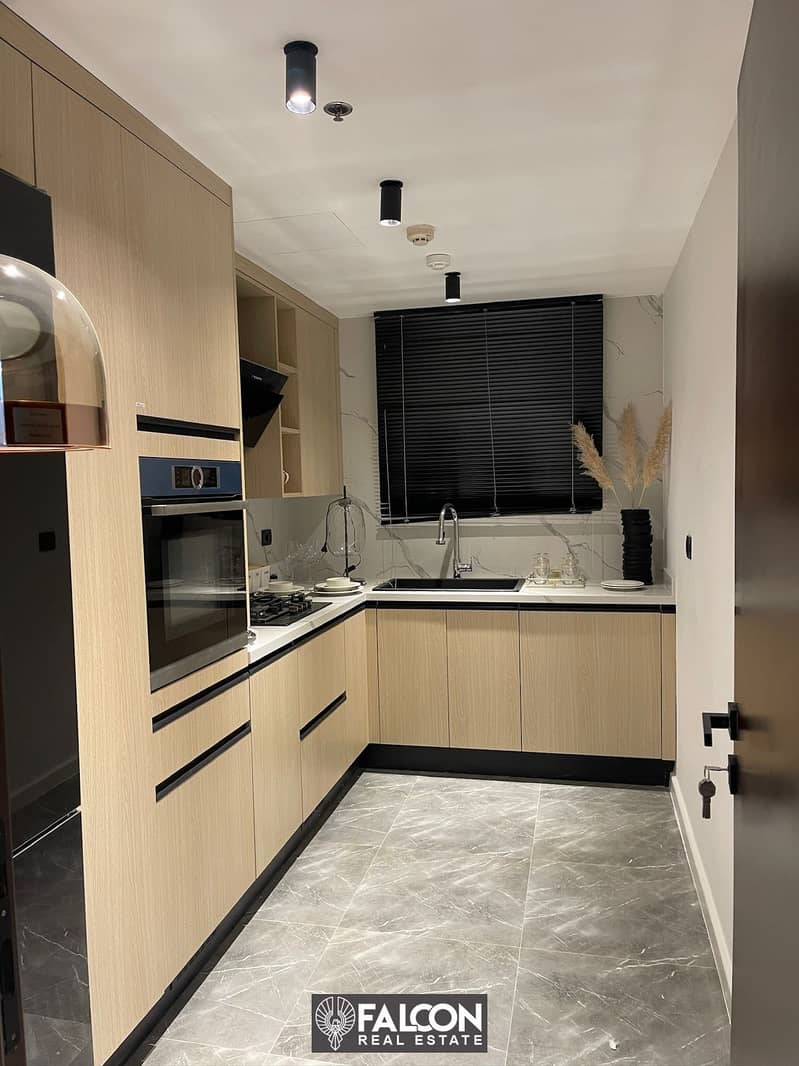 Hotel apartment, ready for delivery soon, with a 35% discount, fully finished, with Marriott hotel services, in a prime location on Al-Thawra Street 3