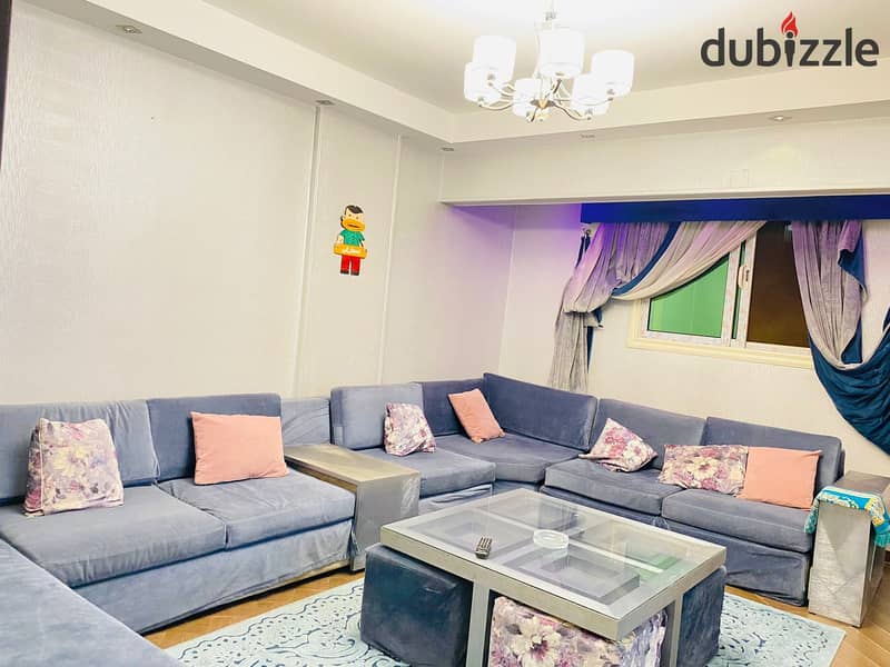 For rent furnished apartment in Dokki Al-Masaha Square modern furniture fully ac’s ninth floor for long periods only 1