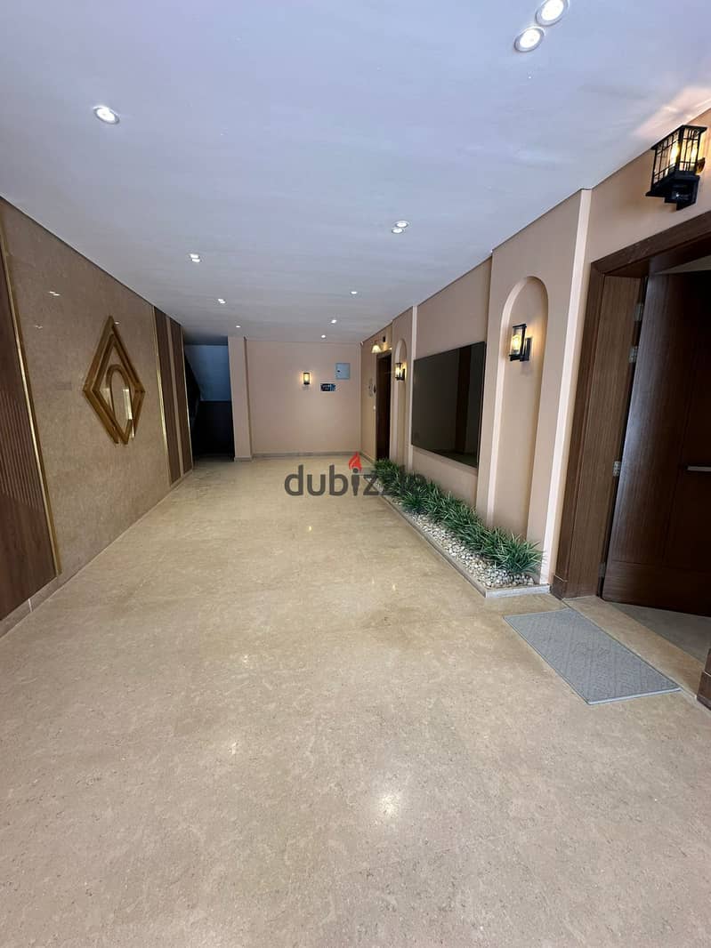 Independent apartment for sale in installments over 4 years in West Village Compound, West Sheikh Zayed, a pearl in the heart of Sheikh Zayed 7