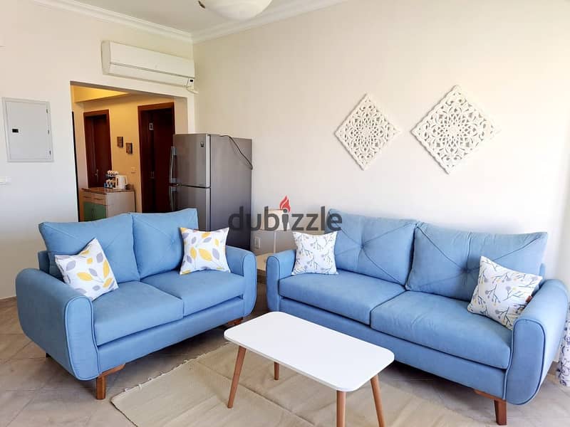 A chalet in Amwaj, the closest area to the sea, with a pool and sea view, two bedrooms, two bathrooms, fully finished with furniture and air condition 4