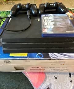 ps4 pro 1 TB with 2 controllers and original box for sale 0