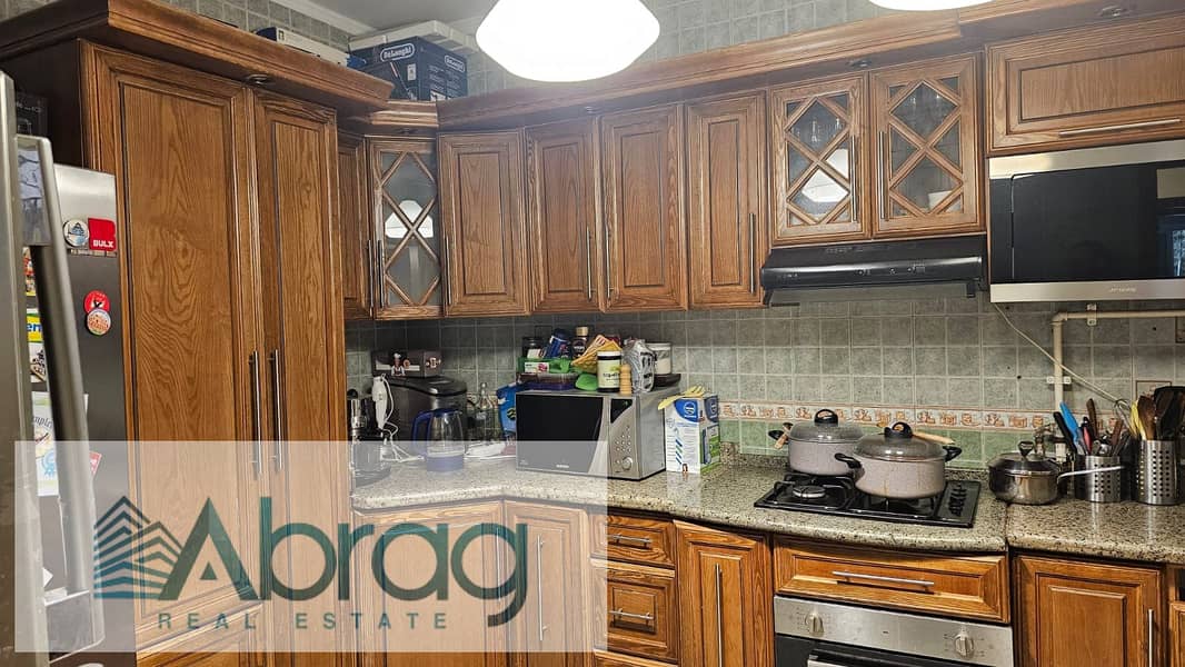 Apartment with Garden Fully Finished For sale in Zayed 2000 Compound - Dorra 7