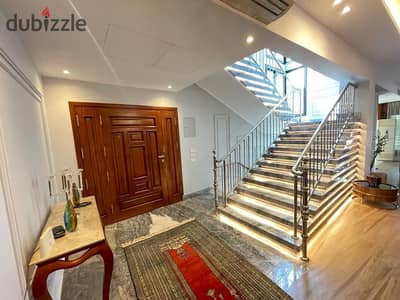 luxurious twin house in sheikh zayed offers a modern design, ideal for a large family seeking comfort and high-end amenities in a prime location