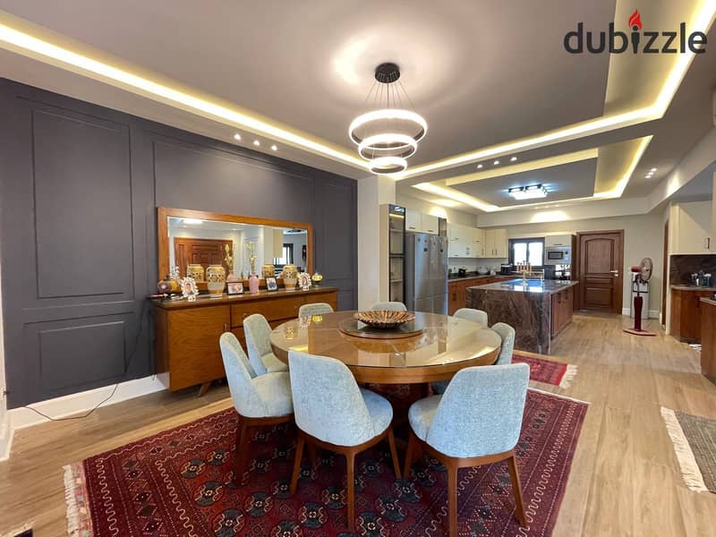 luxurious twin house in sheikh zayed offers a modern design, ideal for a large family seeking comfort and high-end amenities in a prime location 4