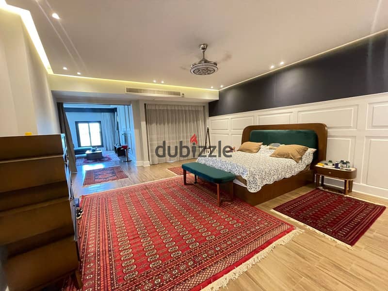 luxurious twin house in sheikh zayed offers a modern design, ideal for a large family seeking comfort and high-end amenities in a prime location 8