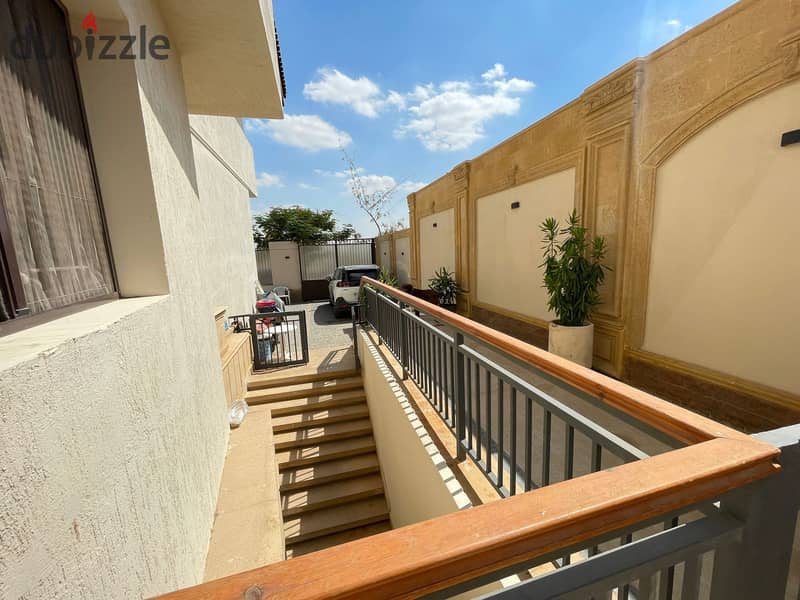 luxurious twin house in sheikh zayed offers a modern design, ideal for a large family seeking comfort and high-end amenities in a prime location 10