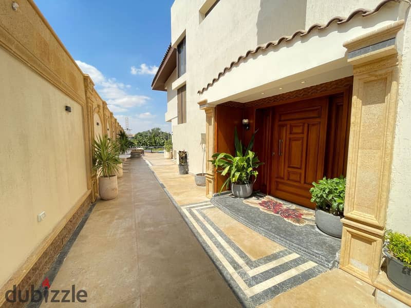 luxurious twin house in sheikh zayed offers a modern design, ideal for a large family seeking comfort and high-end amenities in a prime location 11