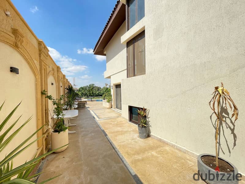 luxurious twin house in sheikh zayed offers a modern design, ideal for a large family seeking comfort and high-end amenities in a prime location 12