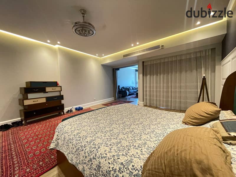 luxurious twin house in sheikh zayed offers a modern design, ideal for a large family seeking comfort and high-end amenities in a prime location 14