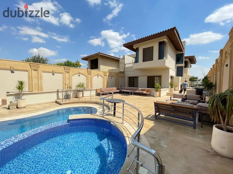 luxurious twin house in sheikh zayed offers a modern design, ideal for a large family seeking comfort and high-end amenities in a prime location 15