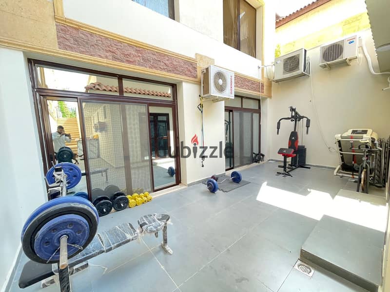 luxurious twin house in sheikh zayed offers a modern design, ideal for a large family seeking comfort and high-end amenities in a prime location 18