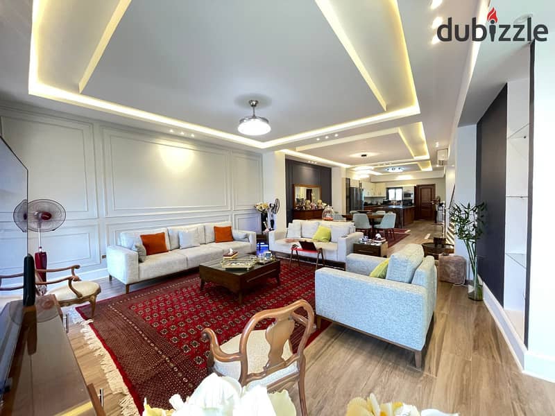 luxurious twin house in sheikh zayed offers a modern design, ideal for a large family seeking comfort and high-end amenities in a prime location 19