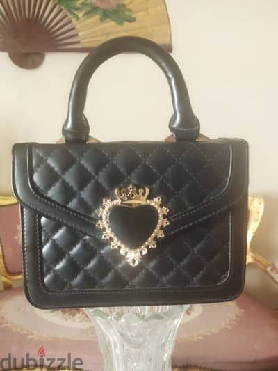 vintage handbag with embellished heart