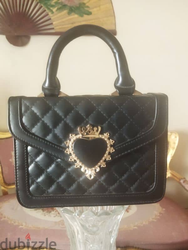 vintage handbag with embellished heart 0