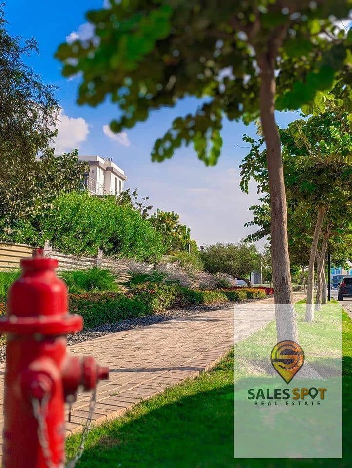 A distinctive garden apartment for sale in Taj City compound, near Nasr City 1