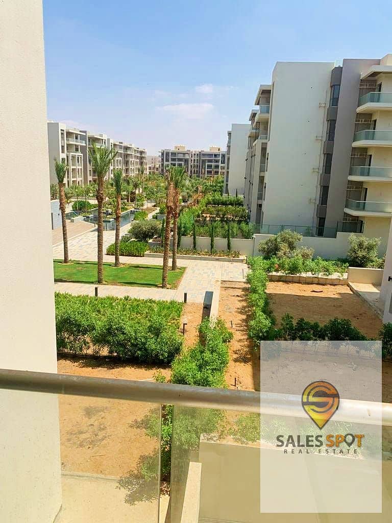 A distinctive garden apartment for sale in Taj City compound, near Nasr City 2