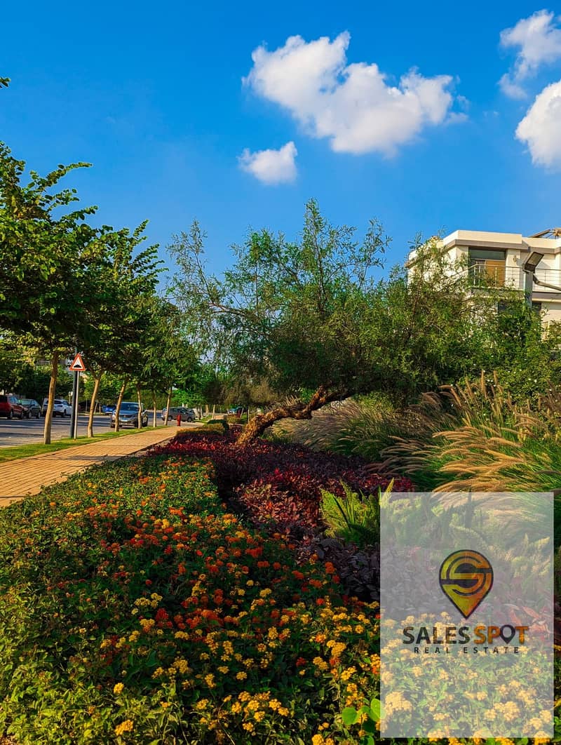 A distinctive garden apartment for sale in Taj City compound, near Nasr City 3