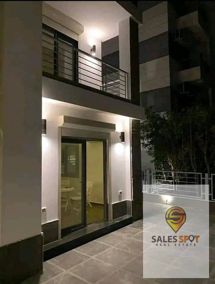 A distinctive garden apartment for sale in Taj City compound, near Nasr City 10