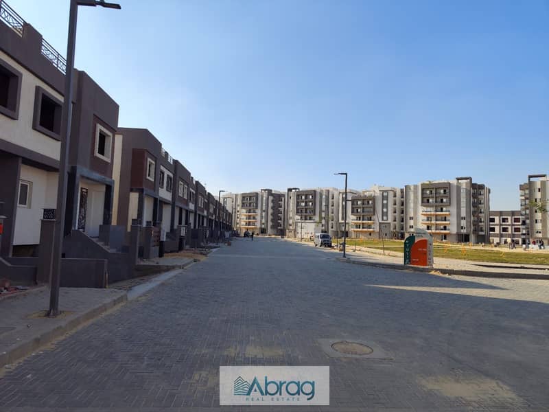 Pay 15% down payment, receive it immediately, and pay the rest in installments over 6 years in a full-service compound in the heart of 6th of October, 3