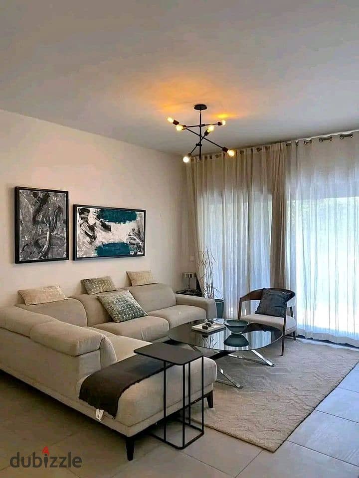 A fully finished apartment to a high standard for sale near the Mercedes dealership, with just a 5% in Al Burouj compound. 4