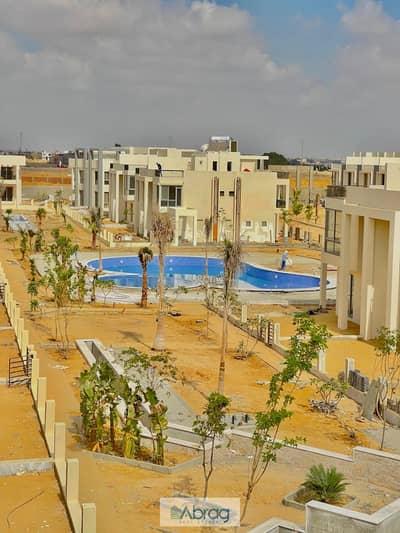 Townhouse for sale in Era Compound, Sheikh Zayed, area of ​​250 meters, middle townhouse in the most distinguished locations in the Green Belt area,