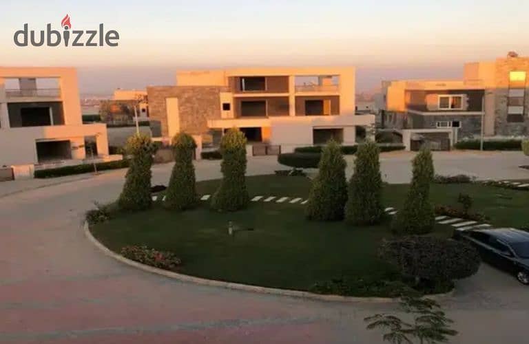 Twin house for sale in the heart of Sheikh Zayed, Alkarma Vaha compound, available for installment payments. 4