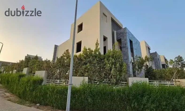 Twin house for sale in the heart of Sheikh Zayed, Alkarma Vaha compound, available for installment payments. 5