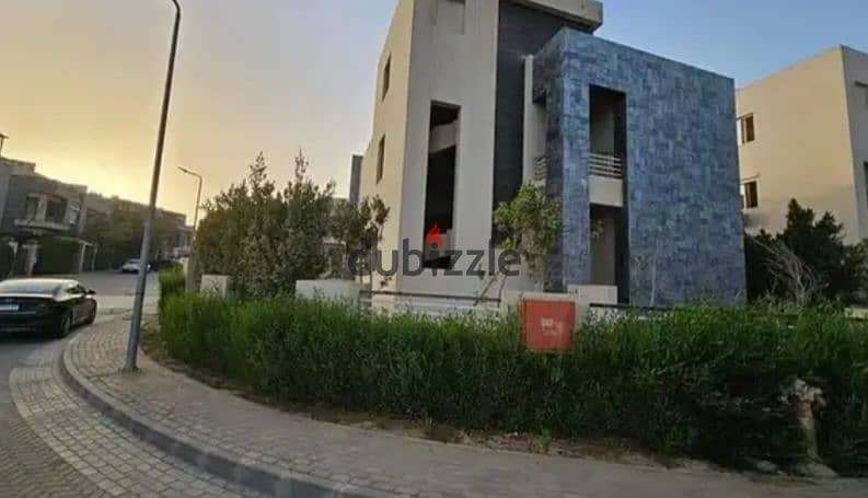 Twin house for sale in the heart of Sheikh Zayed, Alkarma Vaha compound, available for installment payments. 6