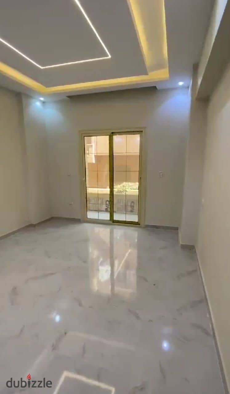 Apartment for sale  In Al-Firdous City, in front of Dreamland Villas, the city's investment center, 4