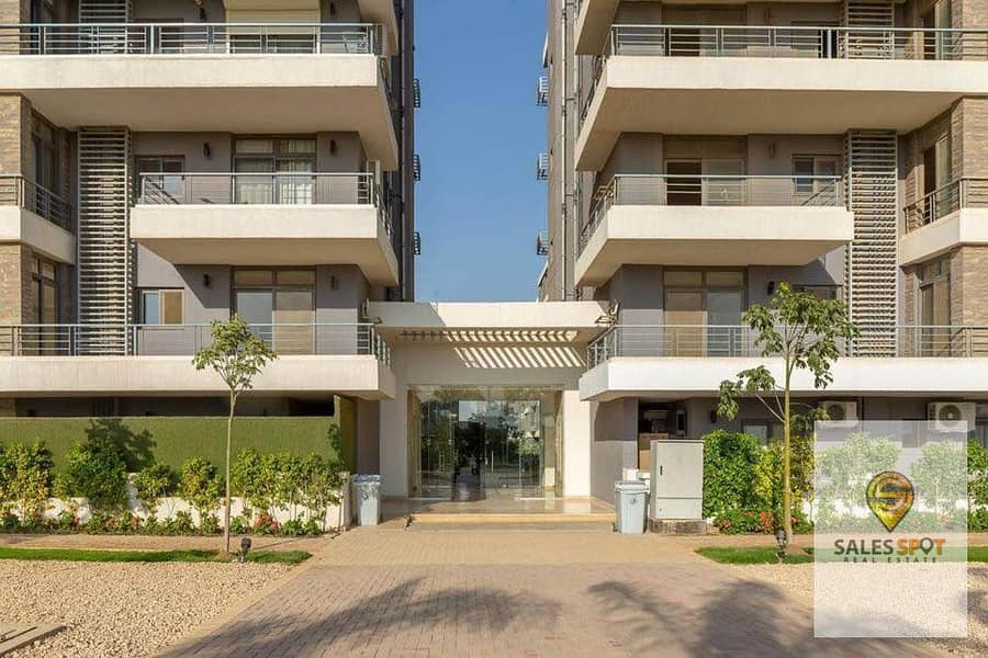 For sale, an apartment with a private garden in a distinguished location in front of Cairo International Airport and minutes from Nasr City (ask about 8