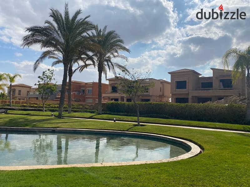 345-meter villa with a swimming pool in the most upscale compound in Sheikh Zayed, in front of Al-Jazira Club, in Swan Lake, Hassan Allam, in installm 1