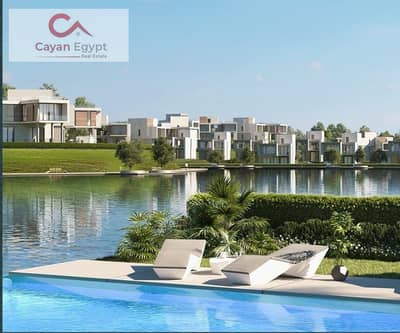 Townhouse villa in the last phase of Garden Lakes Compound from Hyde Park, next to Al Gezira Club and Palm Hills, with installments over 8 years