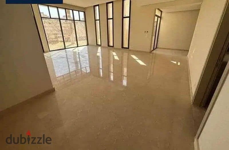 At the lowest price in Sheikh Zayed, a townhouse for sale with a very special view in Vye Sodic Compound 3