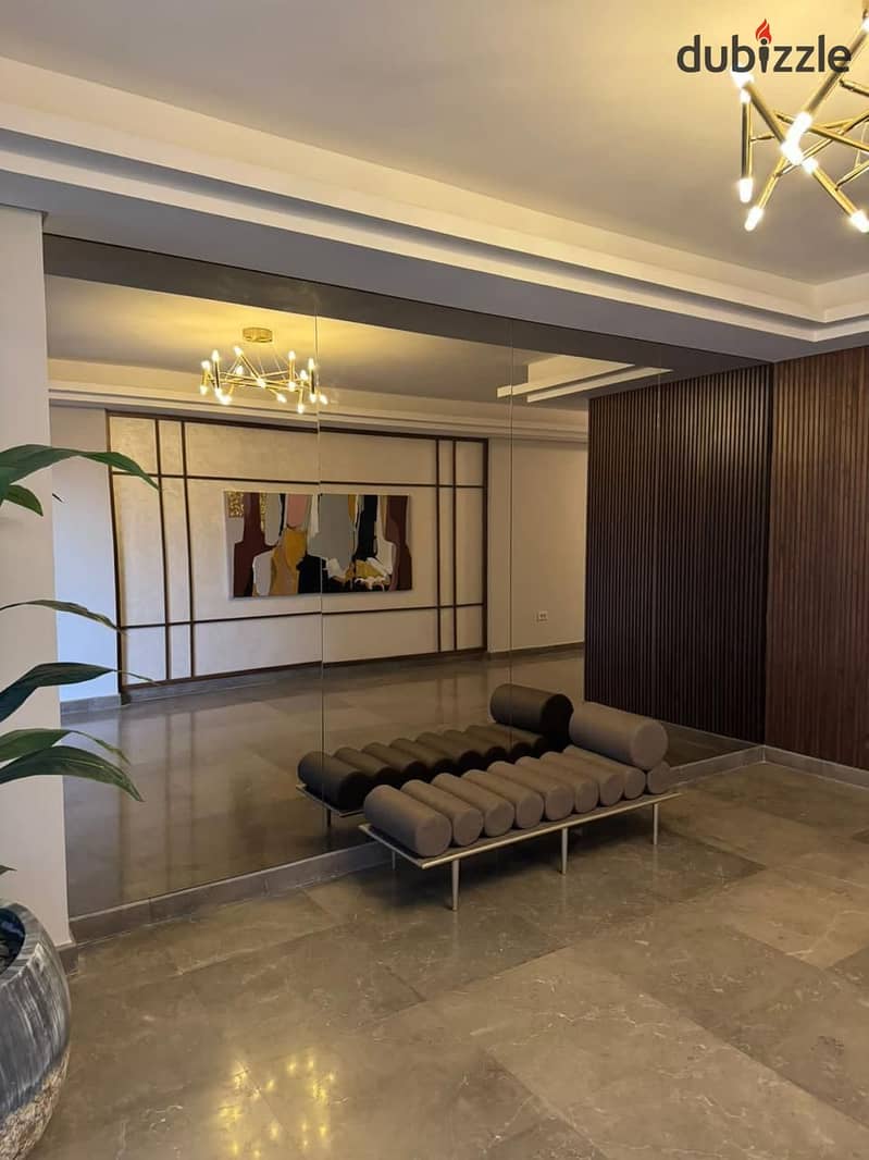 Live in ZED WEST Naguib Sawiris in an apartment with a landscape view, finished with air conditioners,in installments over 8 years in Old Sheikh Zayed 0