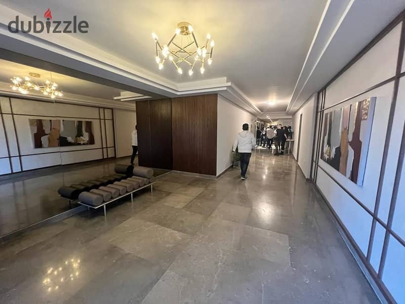 Live in ZED WEST Naguib Sawiris in an apartment with a landscape view, finished with air conditioners,in installments over 8 years in Old Sheikh Zayed 3