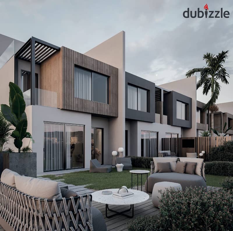 live in a villa directly on Dahshur Street with a landscape view, in installments, next to KARMA GATES in Sheikh Zayed 10