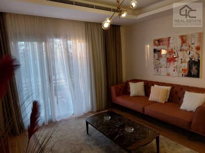 Apartment in garden for sale, finished and furnished, with air conditioners appliances and kitchen 138 sqm, Ready to move at less than the market pric