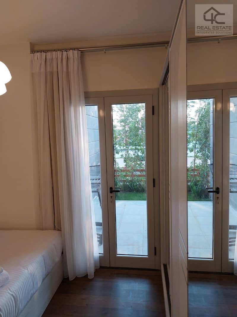 Apartment in garden for sale, finished and furnished, with air conditioners appliances and kitchen 138 sqm, Ready to move at less than the market pric 6