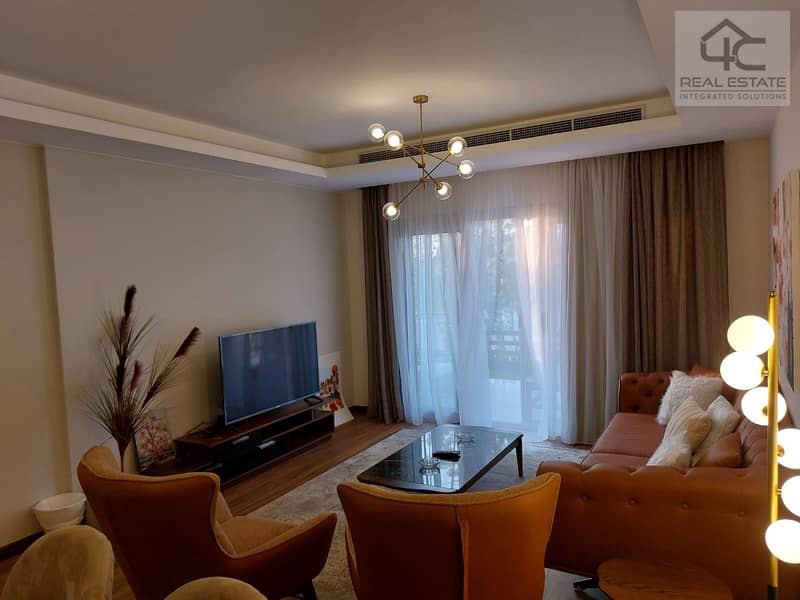 Apartment in garden for sale, finished and furnished, with air conditioners appliances and kitchen 138 sqm, Ready to move at less than the market pric 11