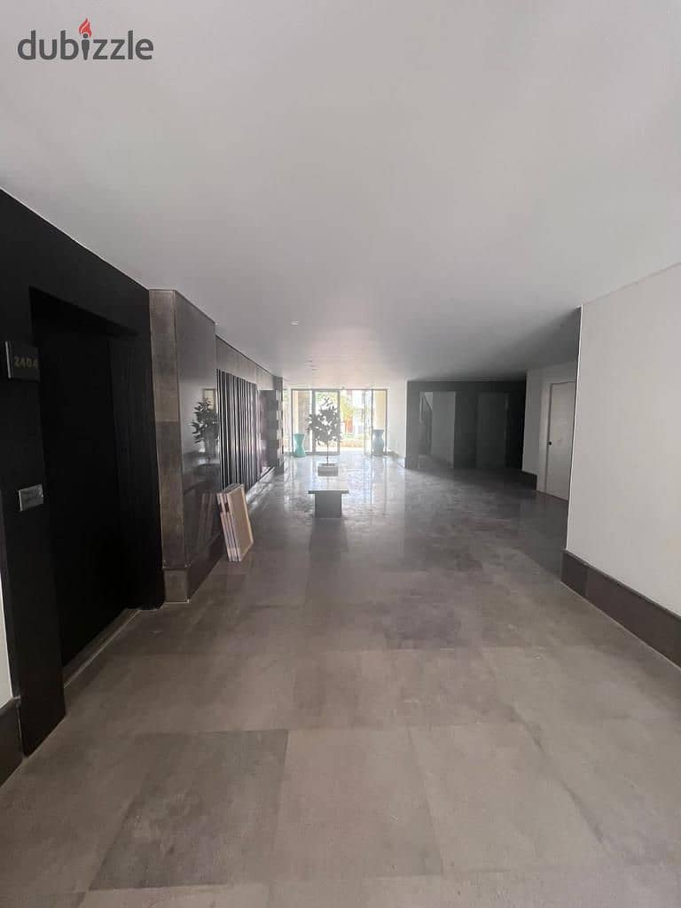 Apartment with garden for sale, resale in the administrative capital, in Bosco Compound, total area 153 m, with garden view. . . . | Fifth Settlement - He 2