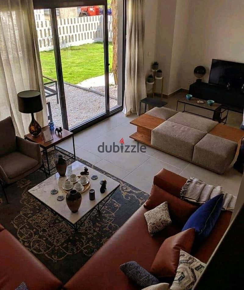 Town house for sale, immediate receipt, fully finished, in Al Burouj, next to Al Shorouk 2