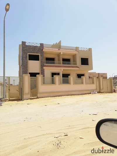 Twin house for sale, Ninth District, Sheikh Zayed, with a distinctive view