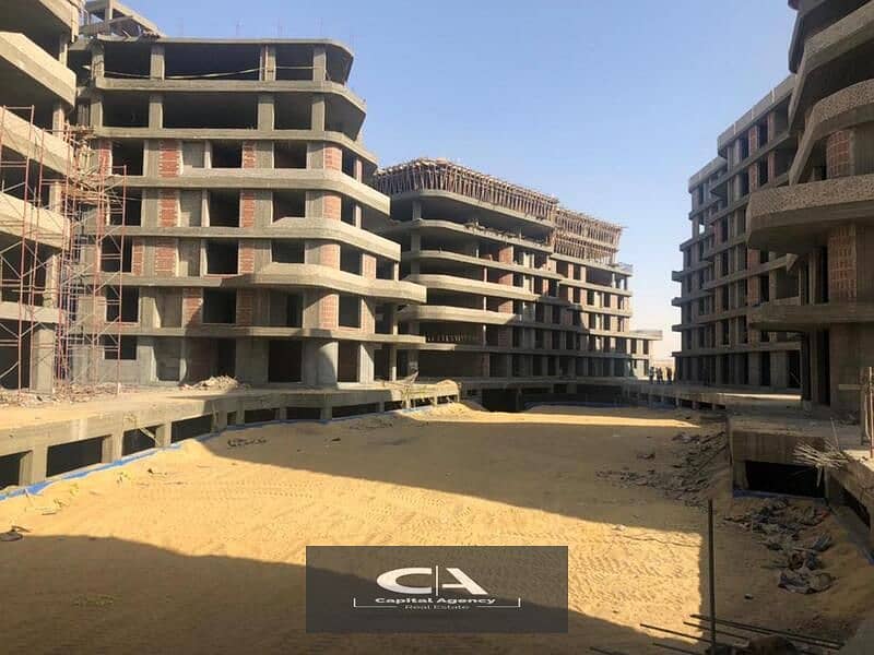 A fully finished two-bedroom apartment directly in front of Madinaty in Bloomfields Compound Offer Tatweer Misr, delivery soon, with only 5% down paym 18