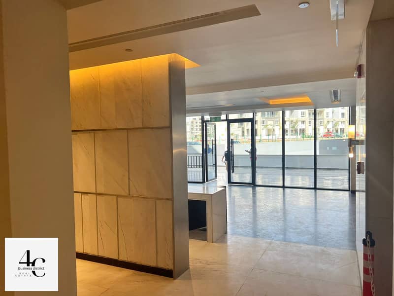 For sale in the best location, an office 65-meter ready to move  in Compound Hyde Park , New Cairo, directly on the 90th Street 3