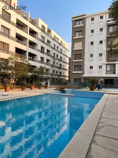 Apartment for sale in installments in the Fifth Settlement in Taj City Compound, North Coast, with a landscape view. . . | Heliopolis - Nasr City - Madi