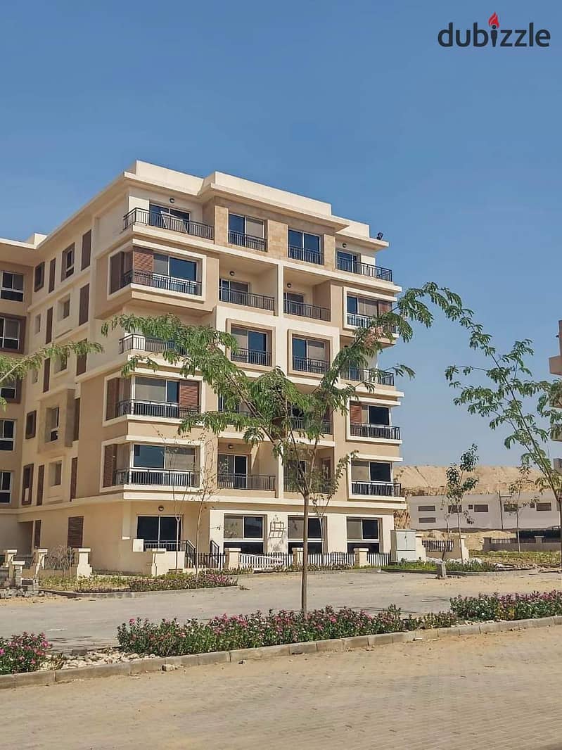 Apartment for sale in installments near Heliopolis and the Ring Road, third floor, with landscape and lagoon view. . . | Taj City - Nasr City - Rehab - 7