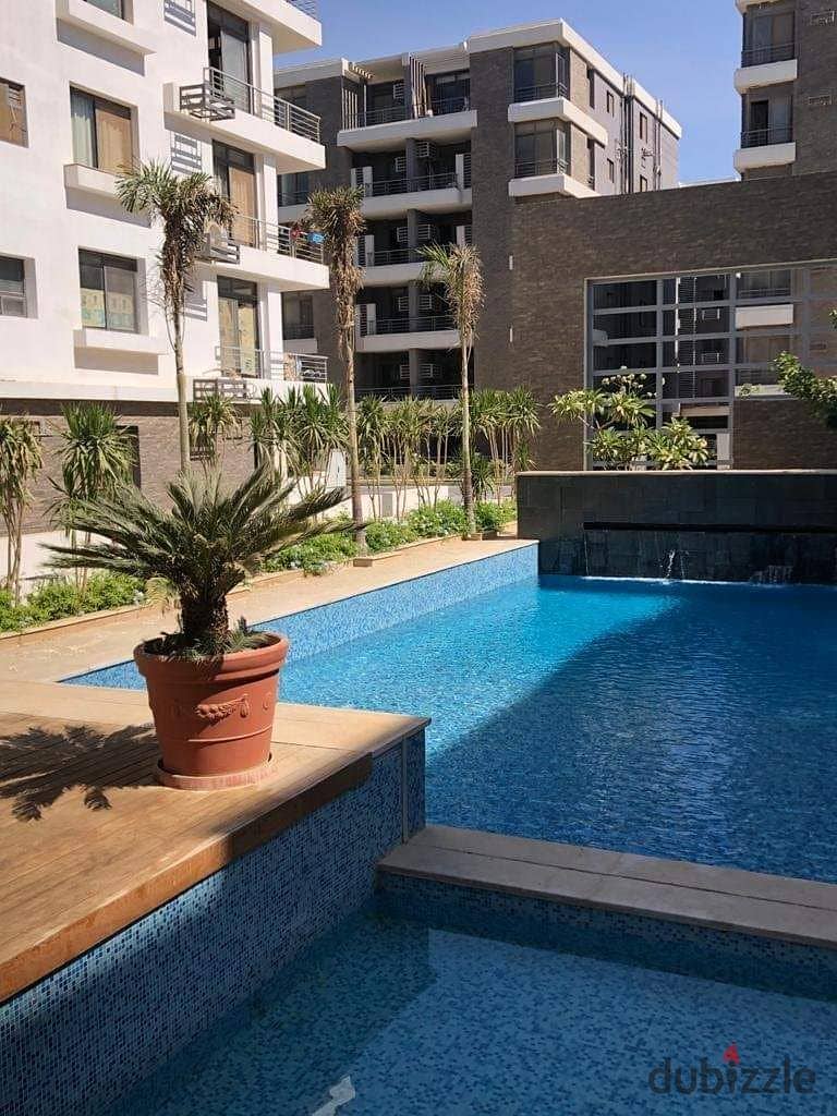 Apartment for sale in installments near Heliopolis and the Ring Road, third floor, with landscape and lagoon view. . . | Taj City - Nasr City - Rehab - 15